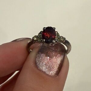 Elegant Silver garnet and peridot ring